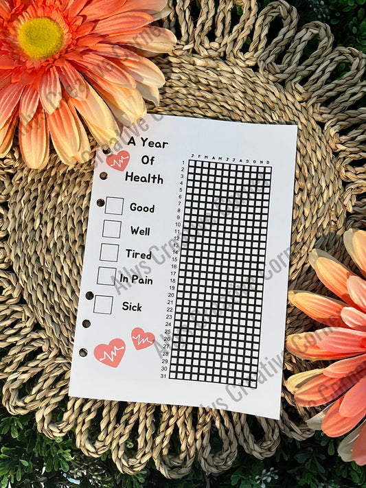 A Year Of Health Tracker Journal Spread